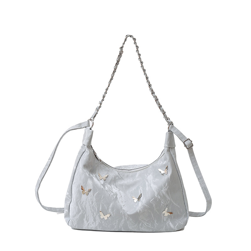 Õla- ja kaenla kott loki motiiviga - PU nahk, suur maht, tõmblukk, sisetaskud telefonile ja ID-le