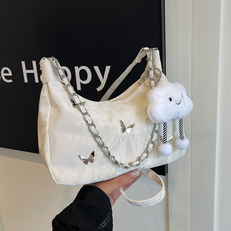 Õla- ja kaenla kott loki motiiviga - PU nahk, suur maht, tõmblukk, sisetaskud telefonile ja ID-le