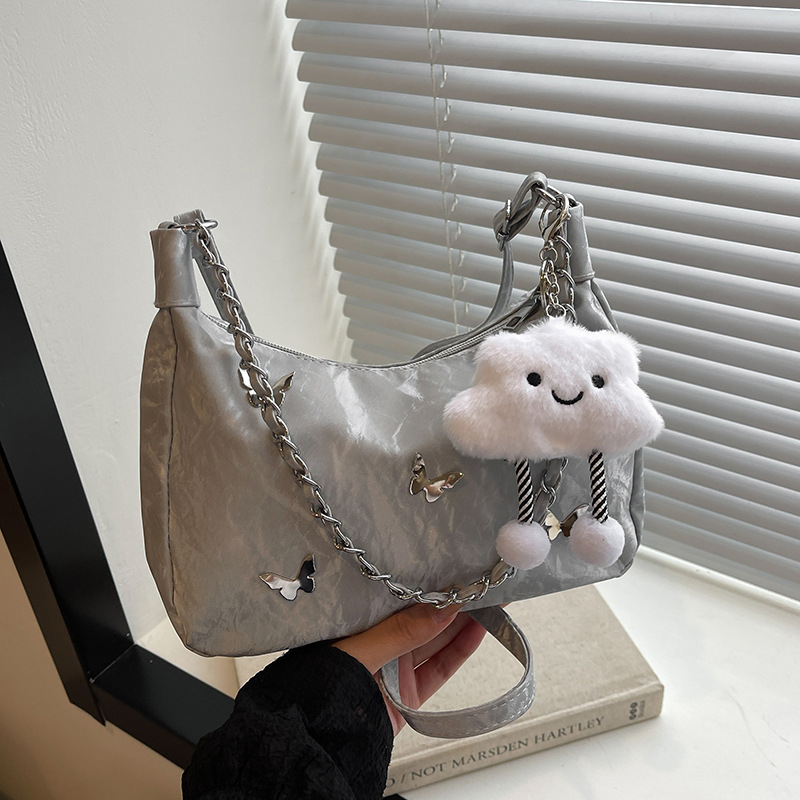 Õla- ja kaenla kott loki motiiviga - PU nahk, suur maht, tõmblukk, sisetaskud telefonile ja ID-le