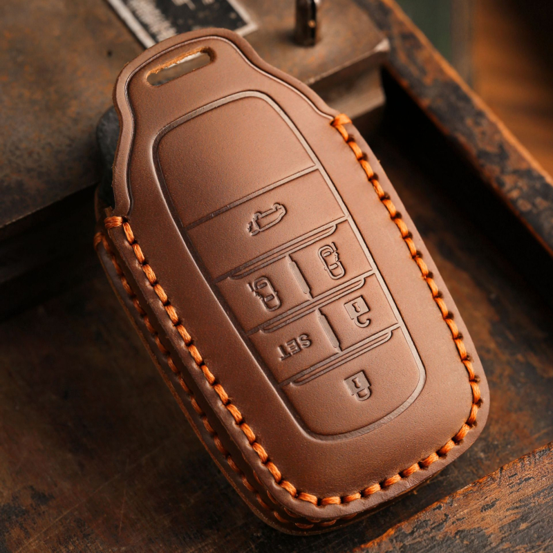 Toyota võtmekate (mudelid Corolla, Avalon, Camry, Levin, C-HR, RAV4) – veisnahk, minimalistlik stiil, hallmo bränd, litsentsitud eribränd, kohandamine puudub