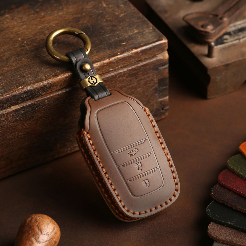 Toyota võtmekate (mudelid Corolla, Avalon, Camry, Levin, C-HR, RAV4) – veisnahk, minimalistlik stiil, hallmo bränd, litsentsitud eribränd, kohandamine puudub