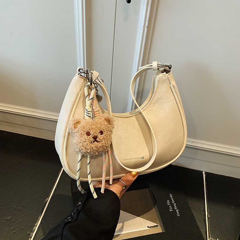 Női alkar-táska, PU anyag, dumpling forma, cipzáros nyitás, belső cipzáros zseb, poliészter bélés