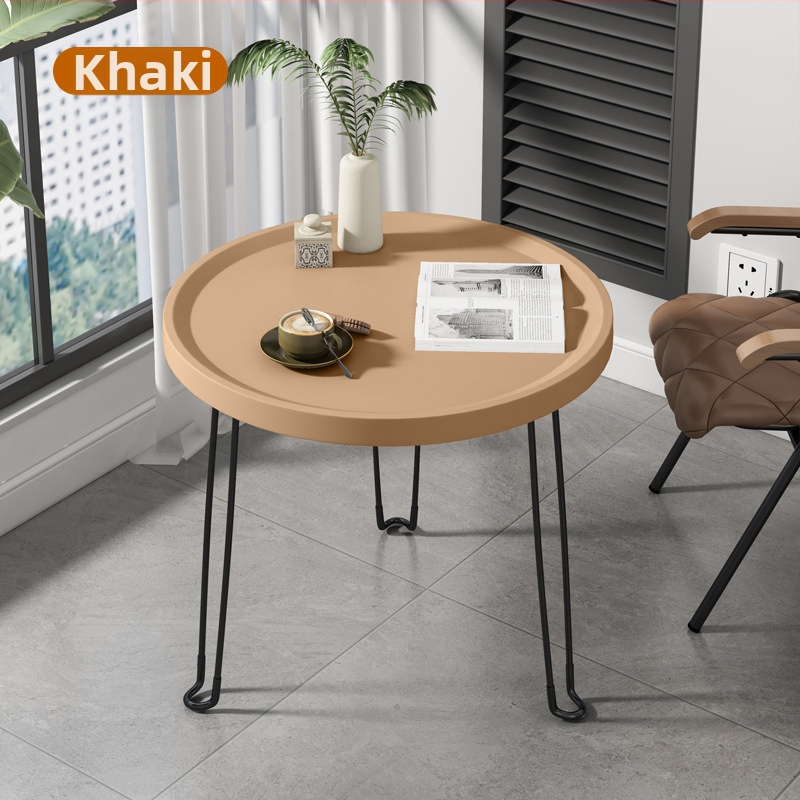 Sulankstomas apvalus plastikinis šoninis staliukas su nerūdijančio plieno rėmu, pritaikomas.