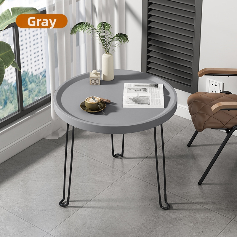 Sulankstomas apvalus plastikinis šoninis staliukas su nerūdijančio plieno rėmu, pritaikomas.