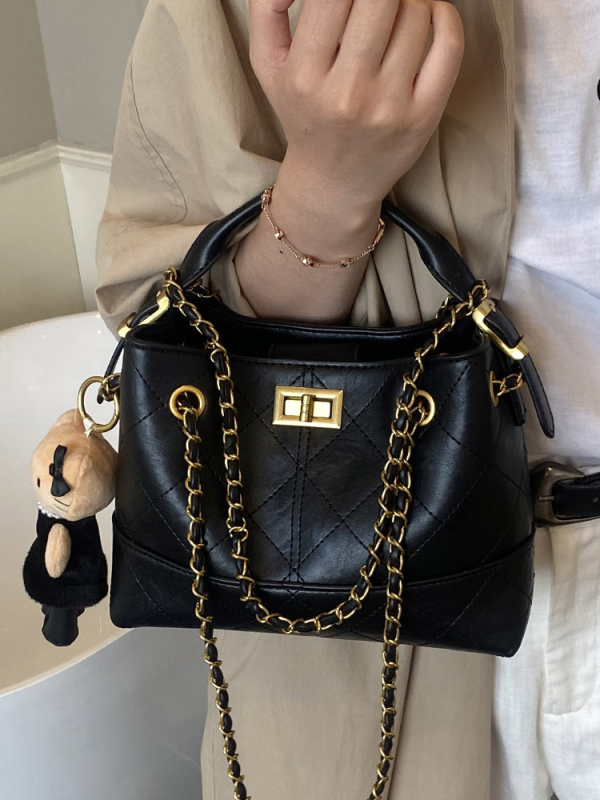 Geantă crossbody bucket din velur cu aspect căptușit (formă orizontal pătrată; închidere cu lacăt; interior laminat cu fermoar; curea simplă)