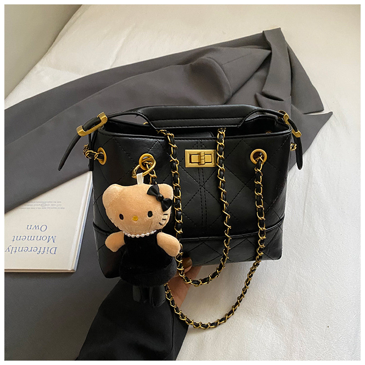 Geantă crossbody bucket din velur cu aspect căptușit (formă orizontal pătrată; închidere cu lacăt; interior laminat cu fermoar; curea simplă)