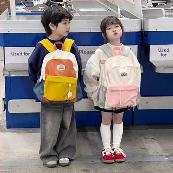 Unisex nailonist kerge lasteaia seljakott kõverate õlarihmadega, ühendatud muster, lõbus karikatuurstiil