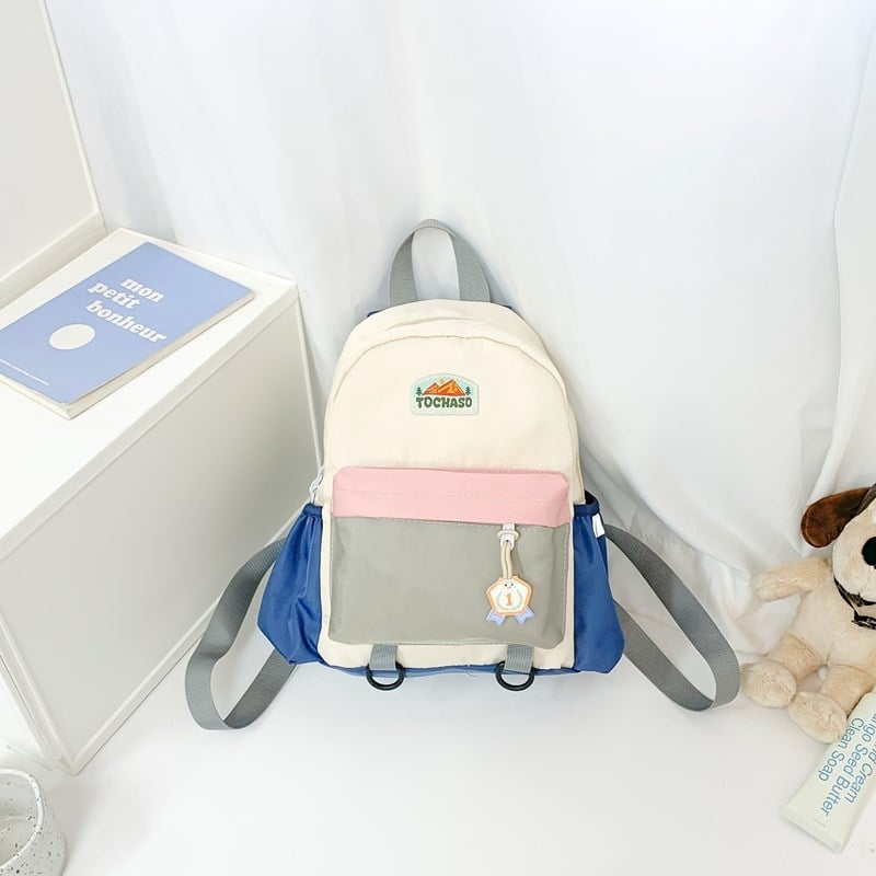 Unisex nailonist kerge lasteaia seljakott kõverate õlarihmadega, ühendatud muster, lõbus karikatuurstiil