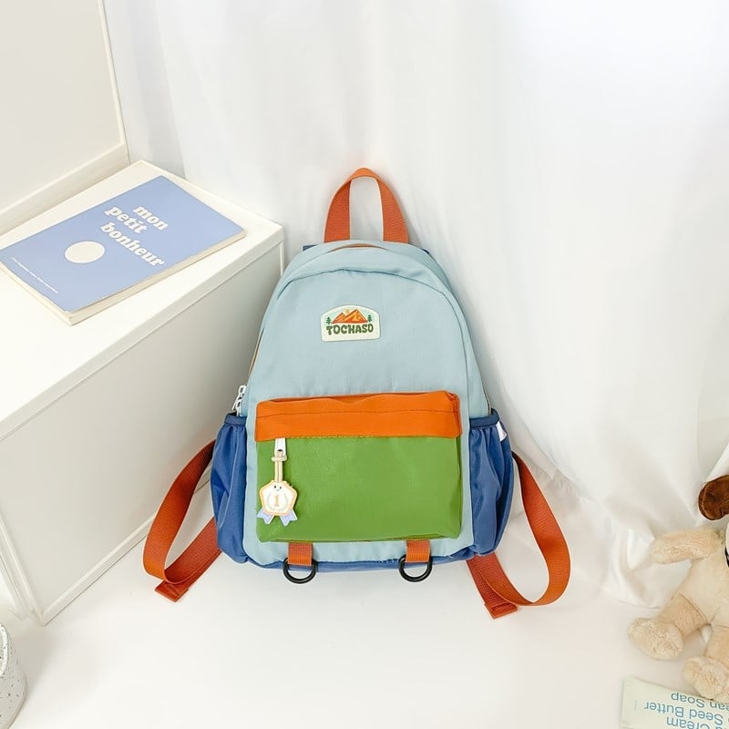 Unisex nailonist kerge lasteaia seljakott kõverate õlarihmadega, ühendatud muster, lõbus karikatuurstiil