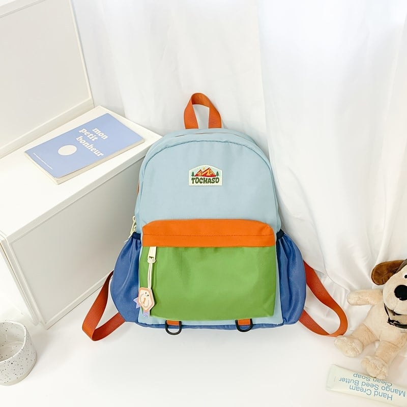 Unisex nailonist kerge lasteaia seljakott kõverate õlarihmadega, ühendatud muster, lõbus karikatuurstiil