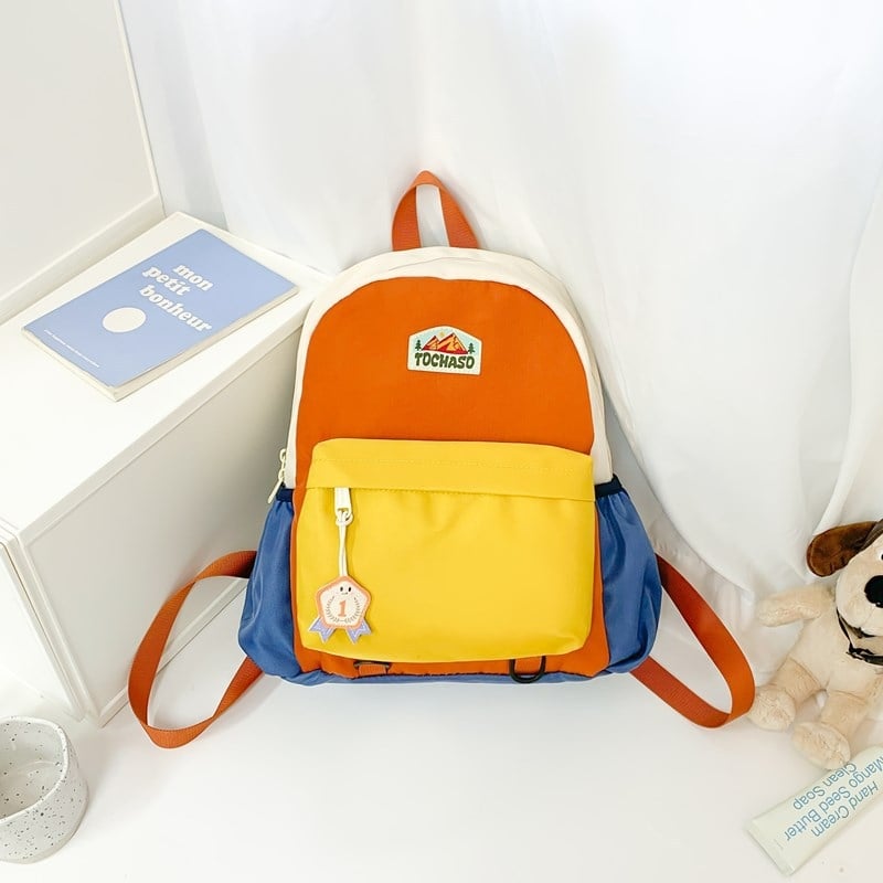 Unisex nailonist kerge lasteaia seljakott kõverate õlarihmadega, ühendatud muster, lõbus karikatuurstiil