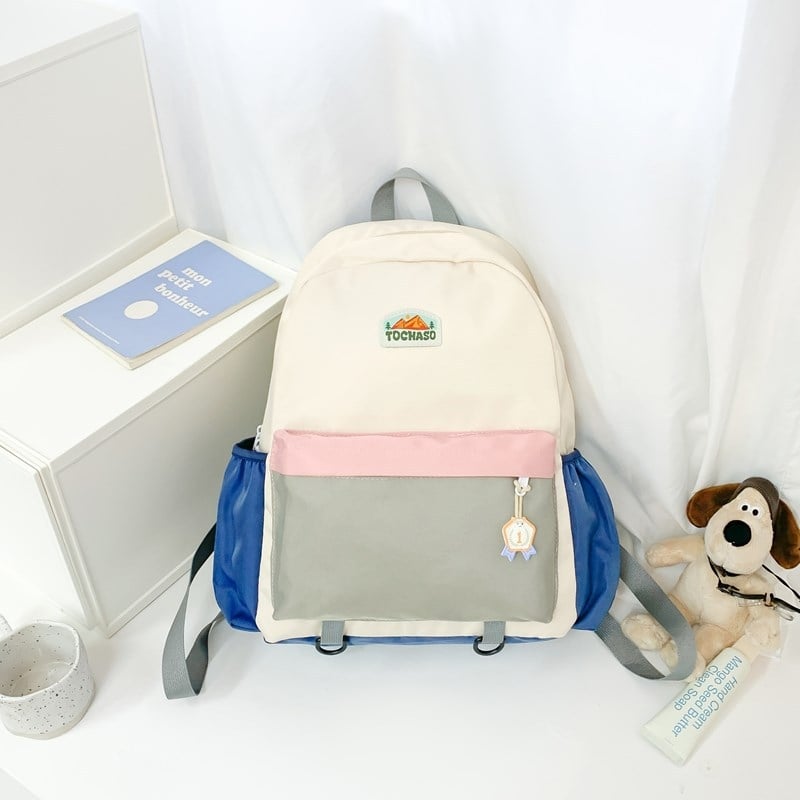 Unisex nailonist kerge lasteaia seljakott kõverate õlarihmadega, ühendatud muster, lõbus karikatuurstiil