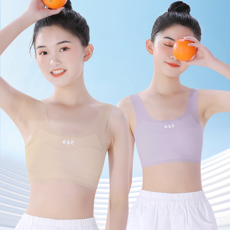 Meitenēm paredzēts apakšveļas komplekts attīstības periodam: bez piedurknēm krekliņš un treniņu krūšturis, neilona/elastāna maisījums 60%/40%, drošības līmenis A, bērniem no 8 gadiem, vasara 2025