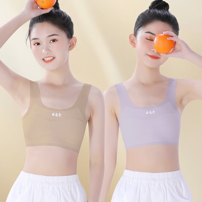 Meitenēm paredzēts apakšveļas komplekts attīstības periodam: bez piedurknēm krekliņš un treniņu krūšturis, neilona/elastāna maisījums 60%/40%, drošības līmenis A, bērniem no 8 gadiem, vasara 2025