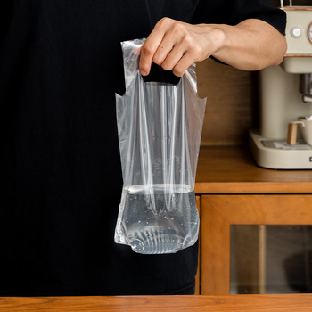 Vienkartinė gėrimų išsinešimui pakuotė, skirta vienam arba dviem puodeliams, skaidri, poliesterio medžiaga, pakuotė 50 vnt. kiekvienam puodelio tipui, tinkama pieno arbatai, kavai, citrinų arbatai ir vaisių arbatai