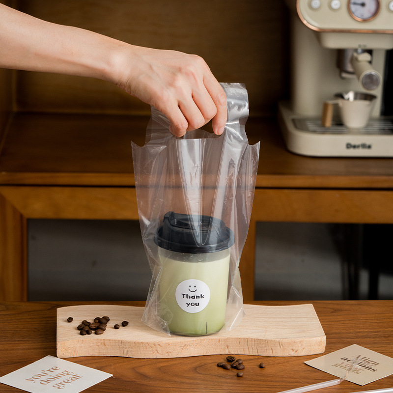 Vienkartinė gėrimų išsinešimui pakuotė, skirta vienam arba dviem puodeliams, skaidri, poliesterio medžiaga, pakuotė 50 vnt. kiekvienam puodelio tipui, tinkama pieno arbatai, kavai, citrinų arbatai ir vaisių arbatai