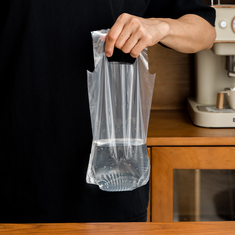 Vienkartinė gėrimų išsinešimui pakuotė, skirta vienam arba dviem puodeliams, skaidri, poliesterio medžiaga, pakuotė 50 vnt. kiekvienam puodelio tipui, tinkama pieno arbatai, kavai, citrinų arbatai ir vaisių arbatai