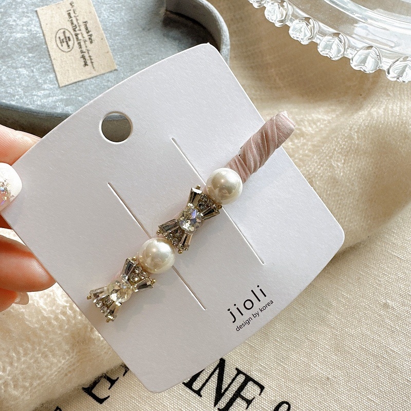 Käsitsi valmistatud juukseklips rhinestoneidega, külgklips ühe märgiga, pikkade pärlitega