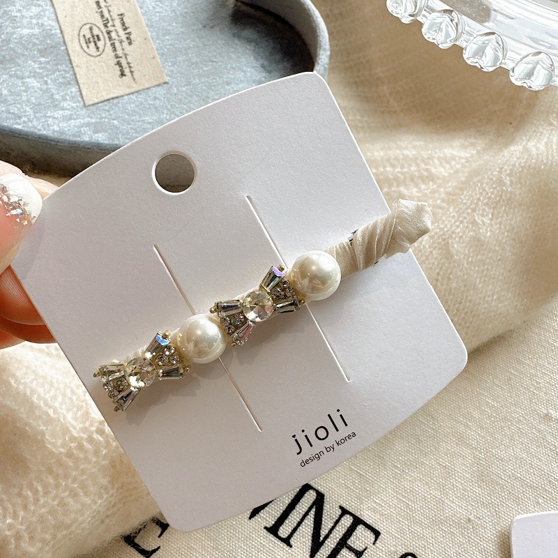 Käsitsi valmistatud juukseklips rhinestoneidega, külgklips ühe märgiga, pikkade pärlitega