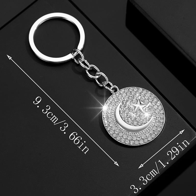 Stilingas ir žavingas unisex raktų pakabukas saulės, žvaigždės, mėnulio ir religinių simbolių formos, visiškai inkrustuotas kristalais.