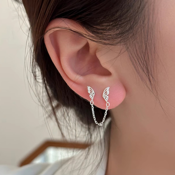 Auskari no 925 sudraba ar tauriņa motīvu un kulšu akcentiem, nišas modes stils sievietēm