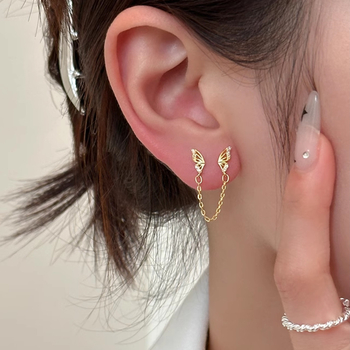 Auskari no 925 sudraba ar tauriņa motīvu un kulšu akcentiem, nišas modes stils sievietēm