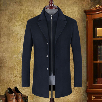 Vilnonis korduro paltas su stovinčiu kaklu, vidutinio ilgio, prigludęs kirpimas, sustorėjęs