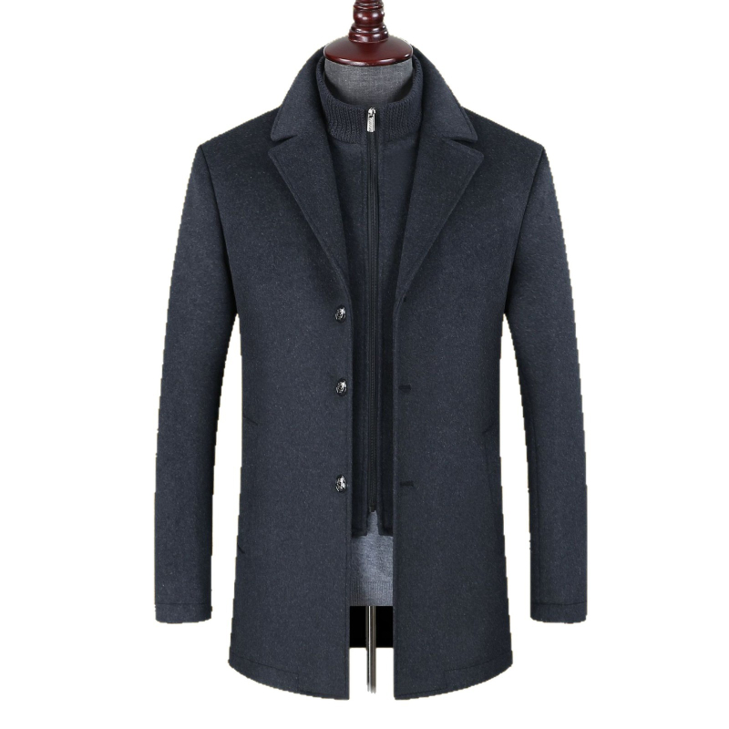 Vilnonis korduro paltas su stovinčiu kaklu, vidutinio ilgio, prigludęs kirpimas, sustorėjęs