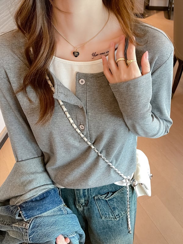 T-särk viskoosi–spandexi segu, pikkade varrukatega, ümmarguse kaelusega, vaba lõikega.