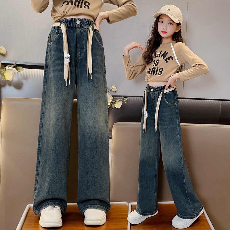 Mergaitėms platėji džinsai su elastine juosta, medvilnės mišinys 38,8%, švelni tekstūra, pavasario–rudens 2025