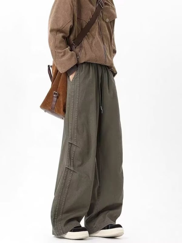 Vīriešu ikdienas poliestera bikses, elpojošs un mitrumu vadīgs audums, viduklis ar vidējo augumu, šņorēšanās aizdare, brīvs taisns griezums, pavasaris–rudens