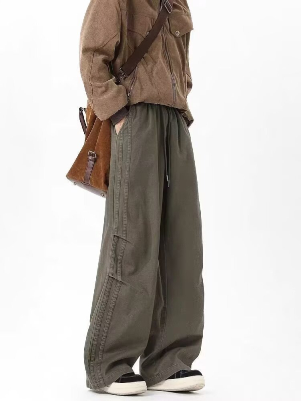 Vīriešu ikdienas poliestera bikses, elpojošs un mitrumu vadīgs audums, viduklis ar vidējo augumu, šņorēšanās aizdare, brīvs taisns griezums, pavasaris–rudens