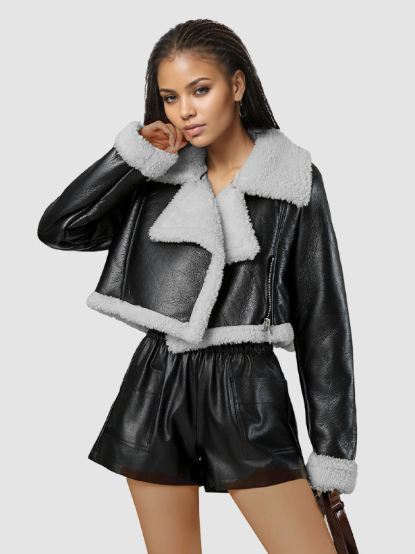 Moterų dirbtinės odos švarkas, trumpas kirpimas, V formos kaklo iškirptė, dirbtinės kailio apykaklė, laisvas siluetas.