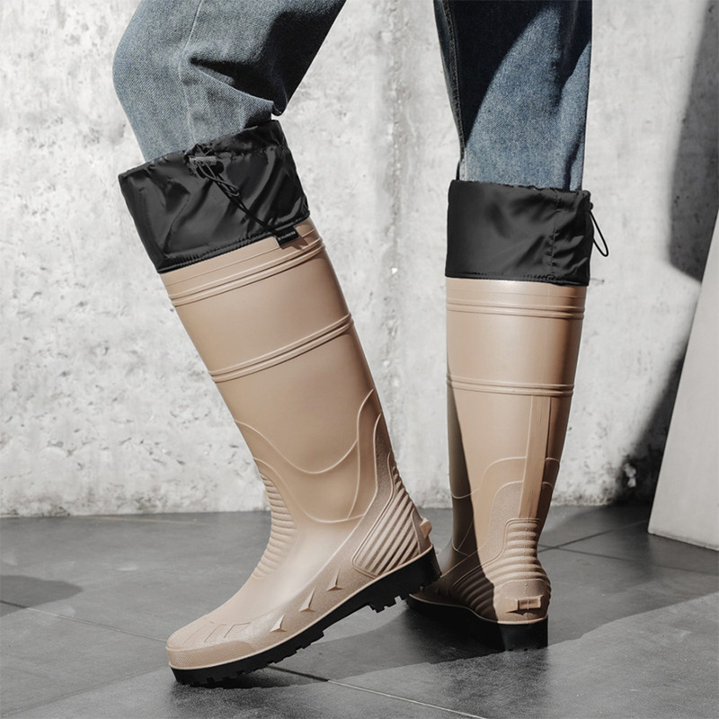 Férfiaknak készült magas szárú PVC esőcsizma, PVC felső és talp, csúszásmentes, négy évszakos, textil belső talp, textil bélés