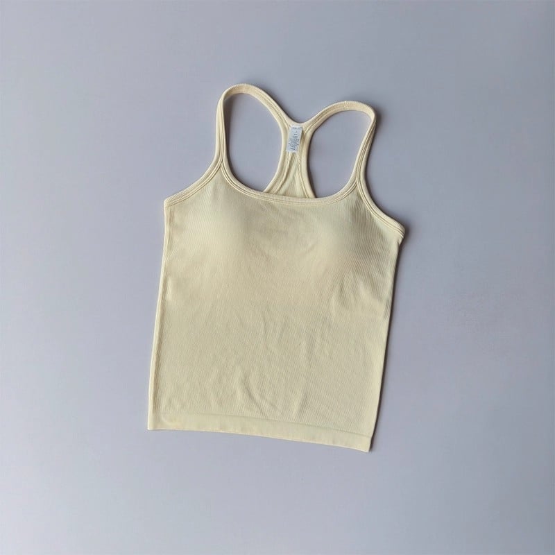 Női Seamless jóga felső, gyorsan száradó nylon-spandex anyag (95% nylon, 5% spandex), mellkasbetéttel, derék hossz, szoros szabás, Nyár 2025