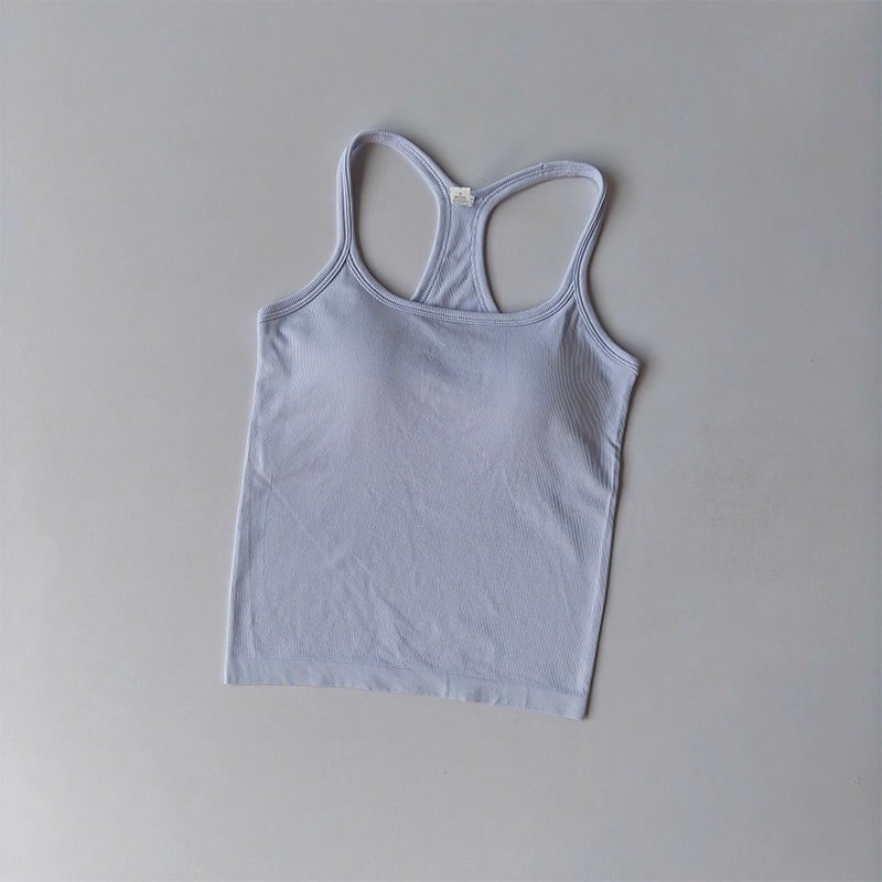 Női Seamless jóga felső, gyorsan száradó nylon-spandex anyag (95% nylon, 5% spandex), mellkasbetéttel, derék hossz, szoros szabás, Nyár 2025