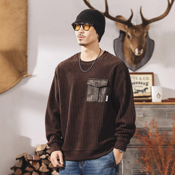 Corduroy džemperis, brīvs piegriezums, apaļš kakls, garas piedurknes, trīsdimensionālas kabatas