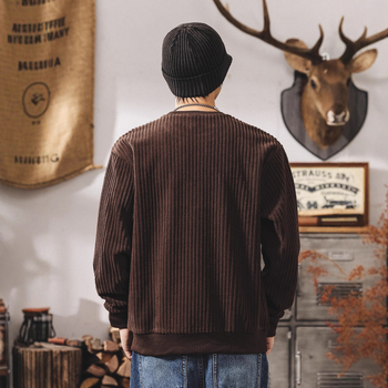 Corduroy džemperis, brīvs piegriezums, apaļš kakls, garas piedurknes, trīsdimensionālas kabatas