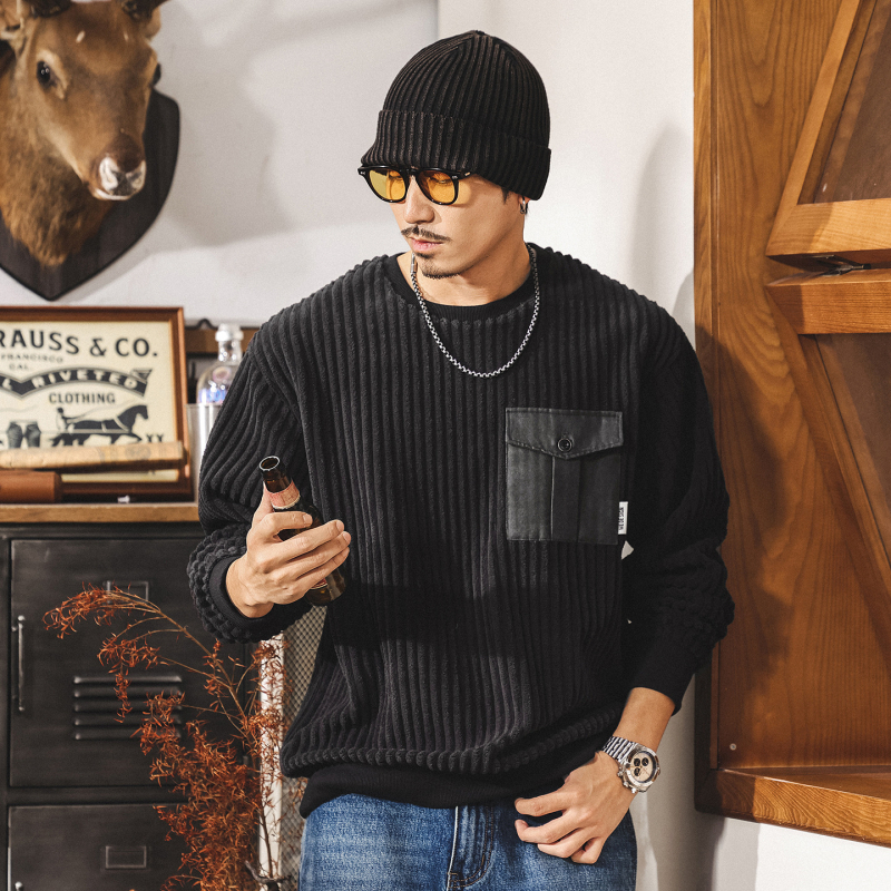 Corduroy džemperis, brīvs piegriezums, apaļš kakls, garas piedurknes, trīsdimensionālas kabatas