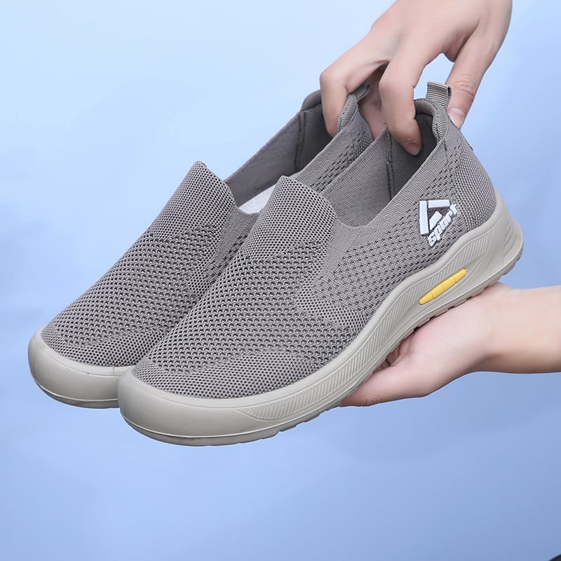 Férfi slip-on sétacipő, lélegző textil felsőrés, injektált poliuretán talp, kerek orr, alacsony boka