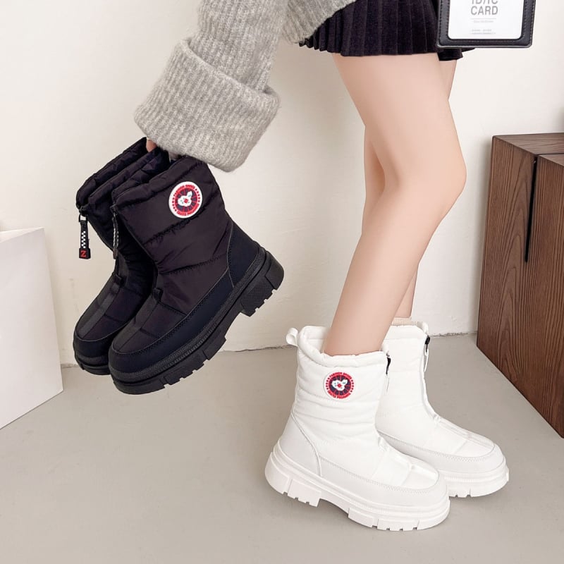 Sieviešu ziemas augstās sniega zābaki, vidēja augšējā daļa, apaļa purngala, sānu rāvējslēdzējs, iekšpuse no mākslīgā pūļa