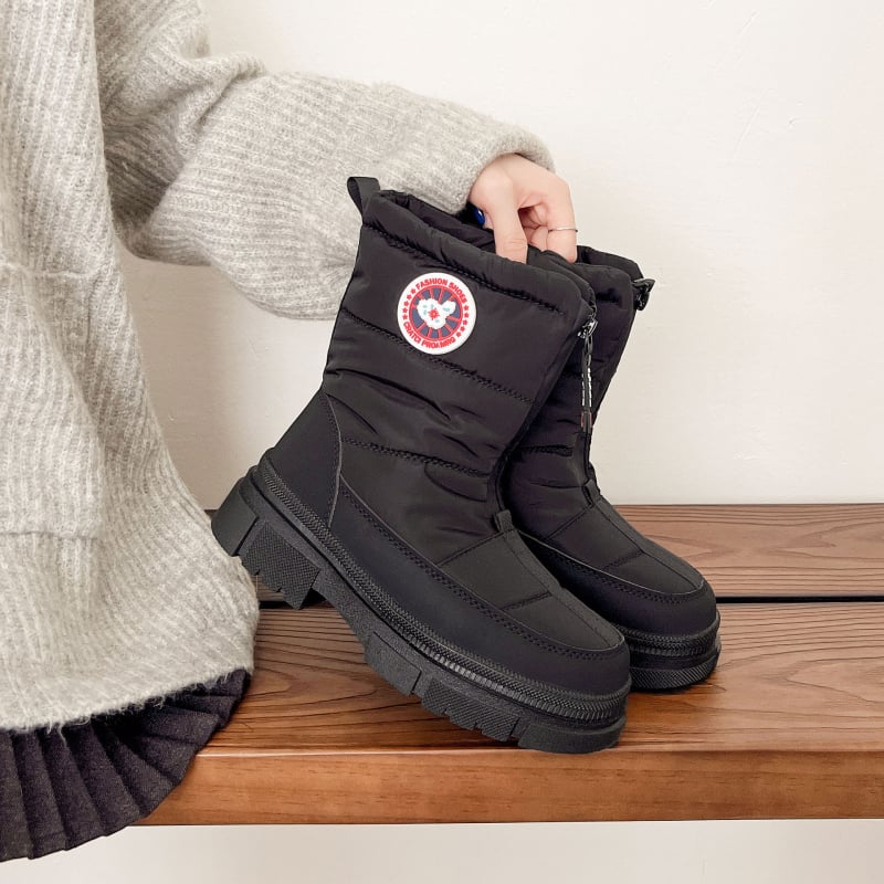 Sieviešu ziemas augstās sniega zābaki, vidēja augšējā daļa, apaļa purngala, sānu rāvējslēdzējs, iekšpuse no mākslīgā pūļa