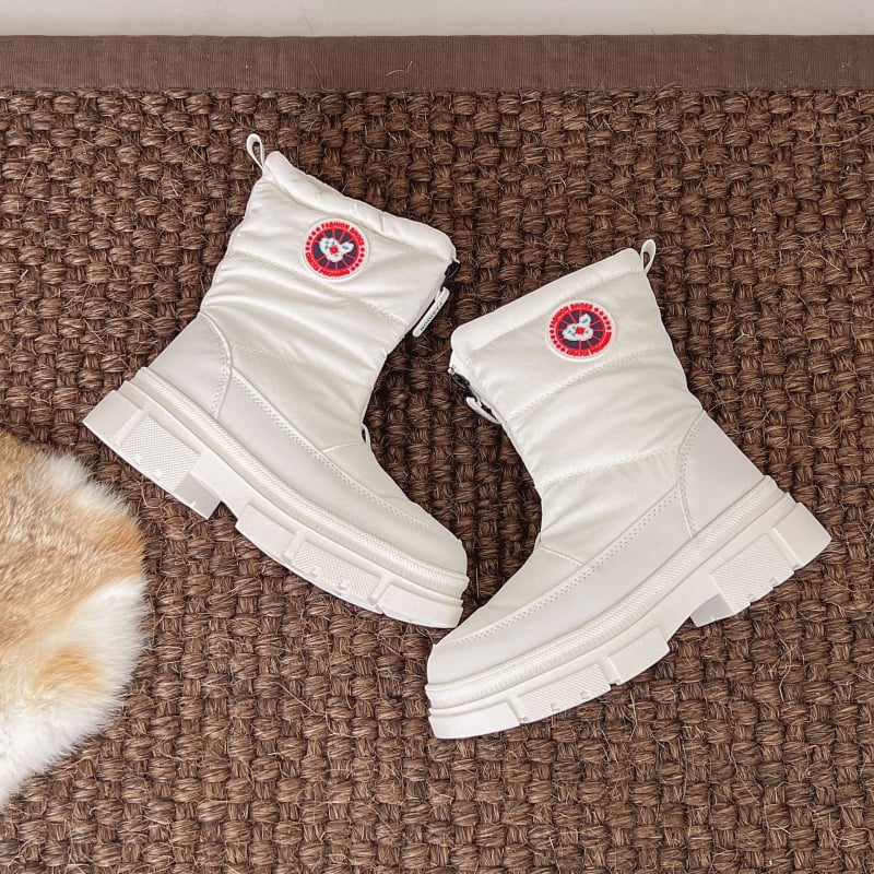 Sieviešu ziemas augstās sniega zābaki, vidēja augšējā daļa, apaļa purngala, sānu rāvējslēdzējs, iekšpuse no mākslīgā pūļa