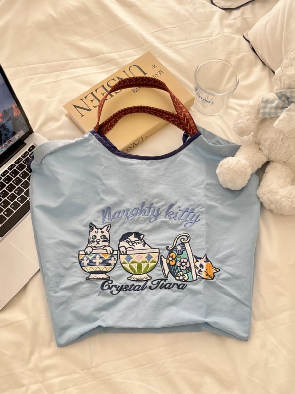 Női nylon táska Shiba Inu hímzéssel, ovális alak, szalag zárás, belső patch zseb