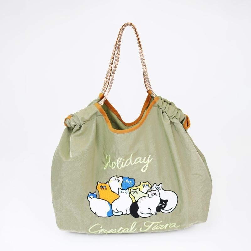 Női nylon táska Shiba Inu hímzéssel, ovális alak, szalag zárás, belső patch zseb