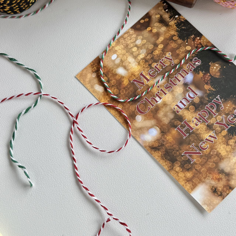 Kokvilnas diegs Jiefeng, 100 m garums, piemērots dāvanas iesaiņojumam, dekorācijām un tekstilizstrādājumiem.