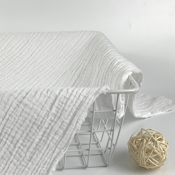 Kétrétegű pamut géz anyag buborékos textúrával és krepp felülettel, 100% pamut, babáknak.