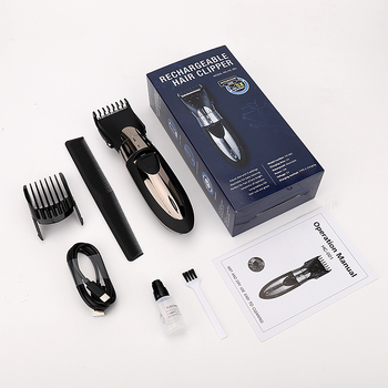 Elektrinis plaukų kirpimo aparatas su šepetėlių varikliu, nerūdijančio plieno peiliai, įmontuota 500–800 mAh baterija, veikimo laikas 1–3 valandos