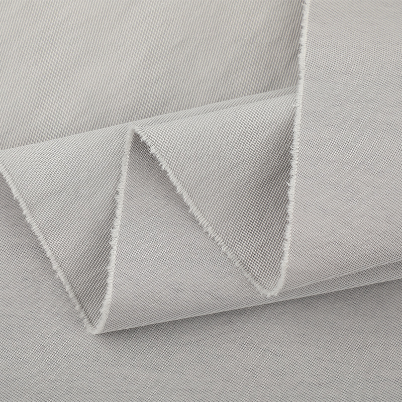 65% medvilnė, 35% nailonas — austas audinys su gėlių raštu pavasario-vasaros sezonai; tinka sijoms, kelnioms, švarkams, paltams, vaikų drabužiams ir kasdieniam garderobui