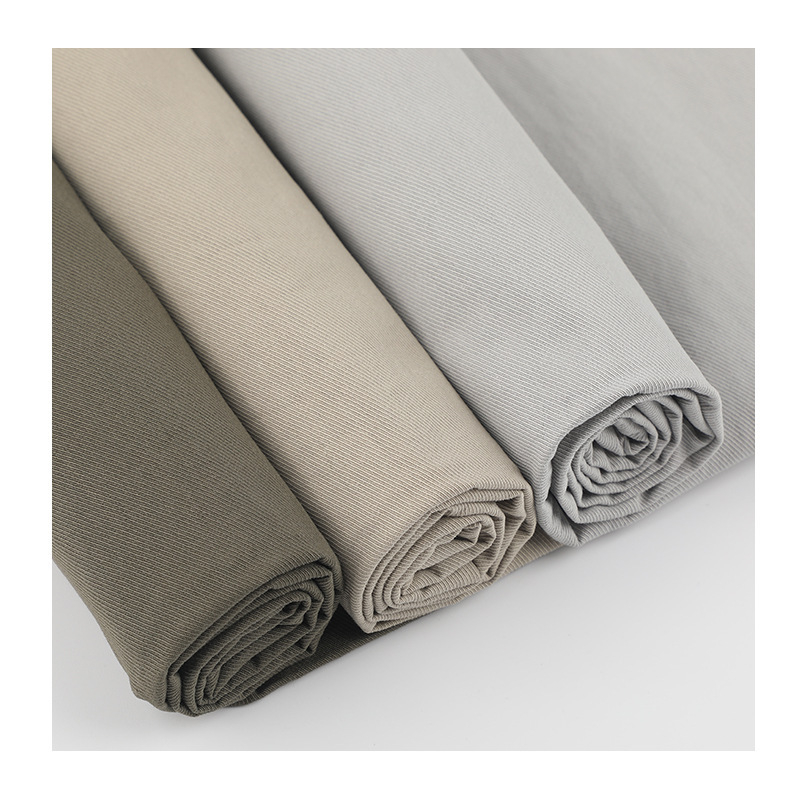 65% medvilnė, 35% nailonas — austas audinys su gėlių raštu pavasario-vasaros sezonai; tinka sijoms, kelnioms, švarkams, paltams, vaikų drabužiams ir kasdieniam garderobui